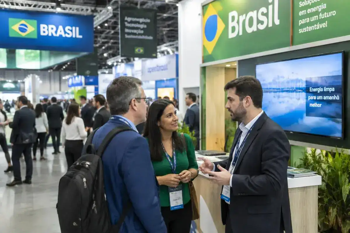 International exhibitors at a trade show stand in São Paulo